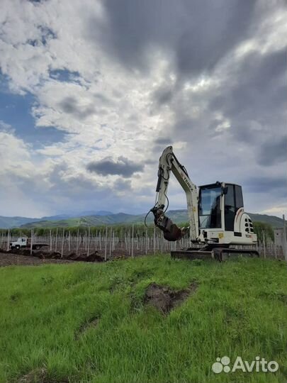 Мини-экскаватор