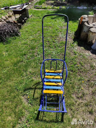 Детские санки с колесами и пологом