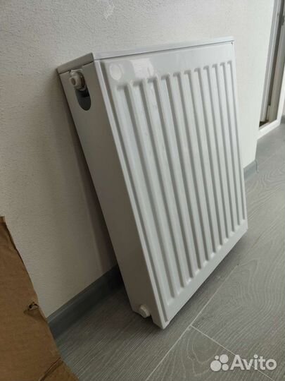 Стальной радиатор отопления с нижним подключением