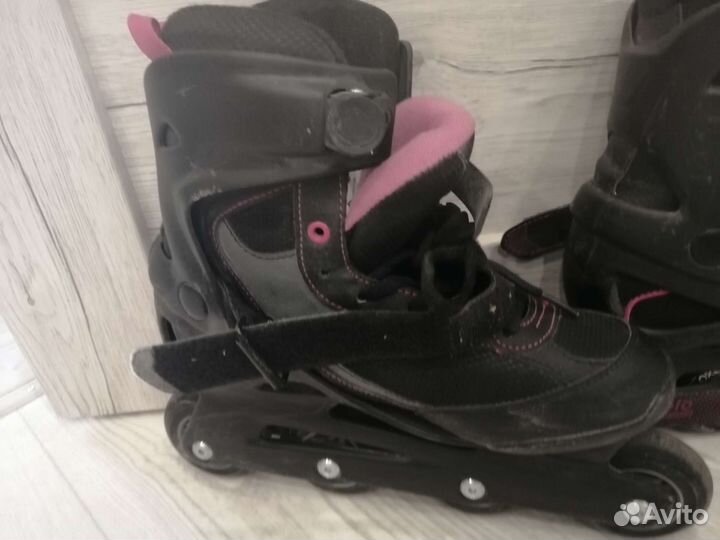 Роликовые коньки