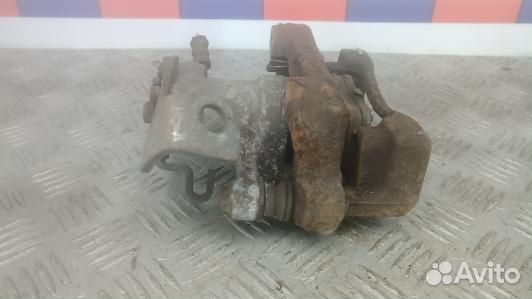 Суппорт тормозной задний левый toyota auris E150 (IUK13LS02)