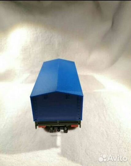 Камаз 43101-010 с синим тентом, зеленого цвета