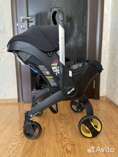 Коляска автолюлька doona