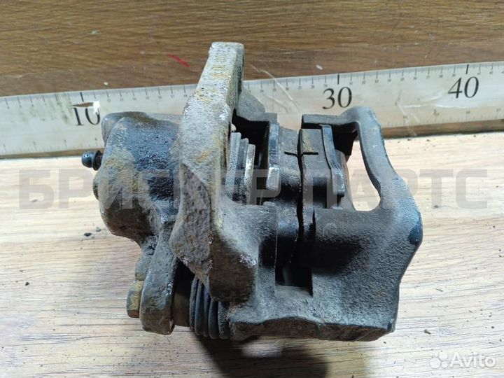 Суппорт передний Рено Логан 1