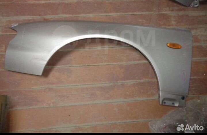 Крыло левое mazda millenia 1998