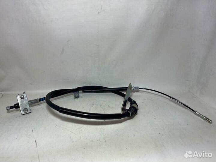 Трос стояночного тормоза левый Ssangyong Actyon