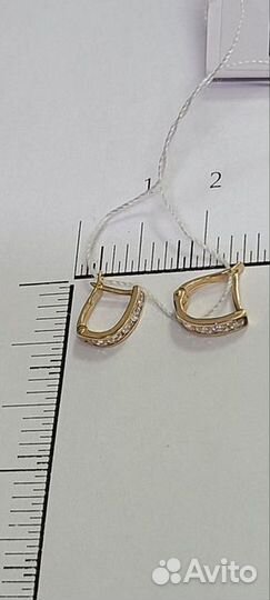 Золотые серьги с камнем