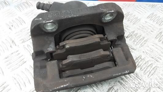 Суппорт тормозной передний левый dacia sandero 1