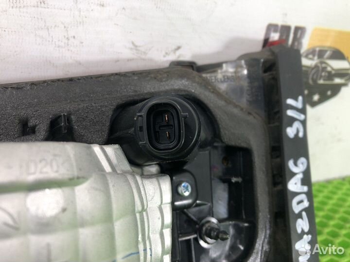 Фонарь в крышку багажника левый L Mazda 6