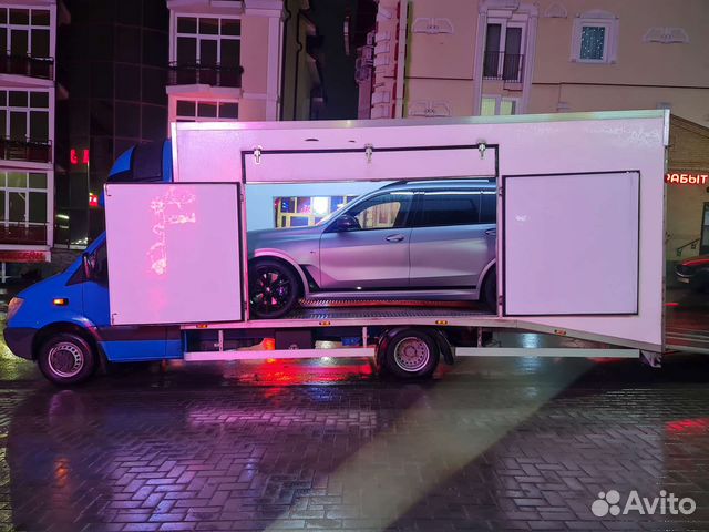 Крытый эвакуатор автовоз