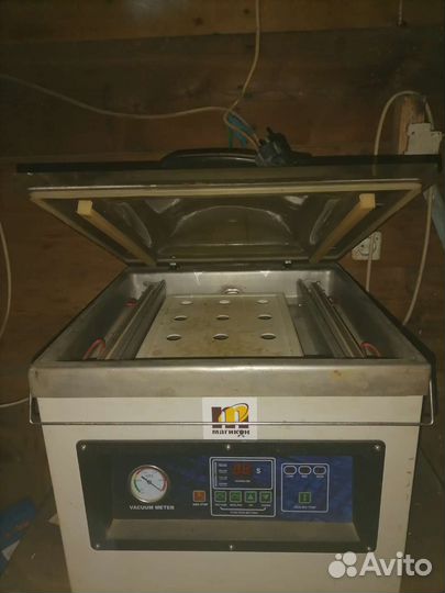 Вакуумный упаковщик
