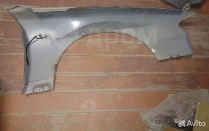 Крыло левое mazda millenia 1998