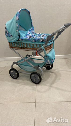 Детская игрушечная коляска