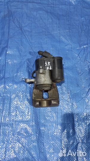 Суппорт тормозной задний правый Volkswagen Passat