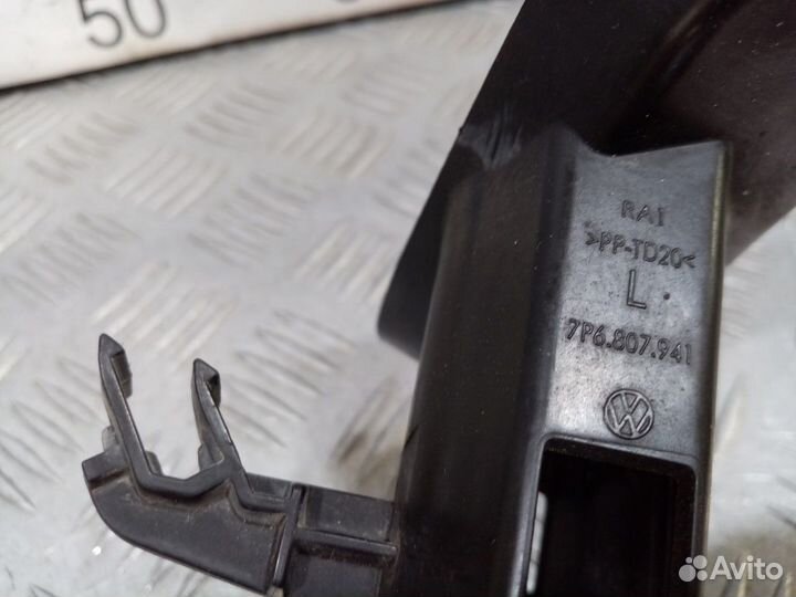 Б/У Кронштейн форсунки омывателя фары#001