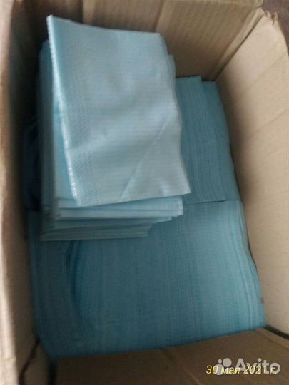 Нагрудники бумажно - полиэтиленовые