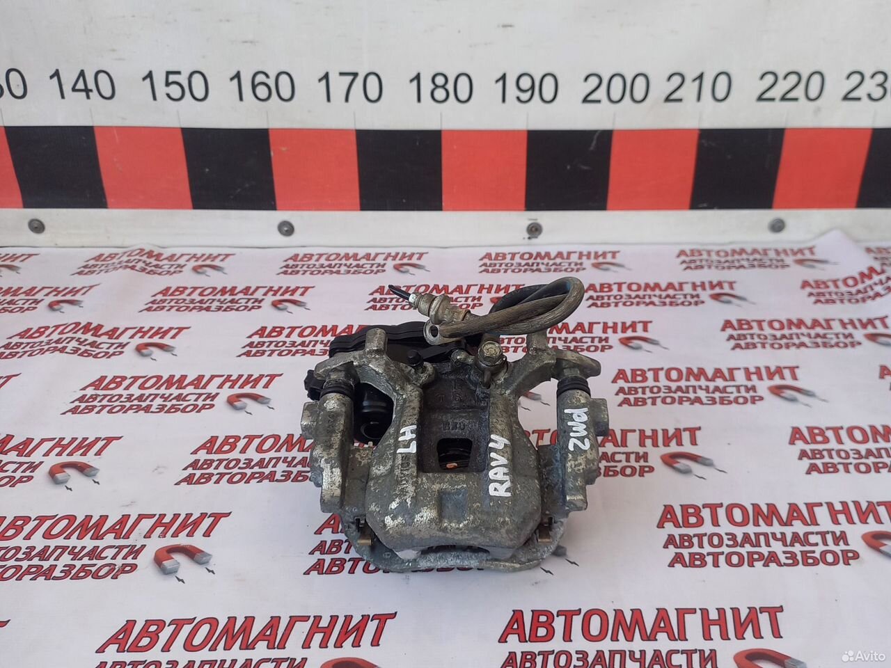 Супорт тормозной задний левый Тойота Рав 4 50