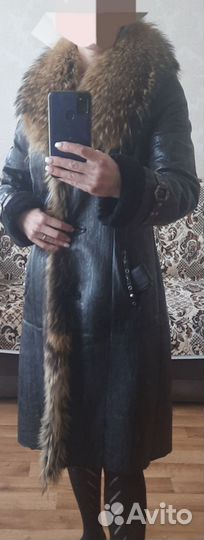 Дубленка с мехом енота