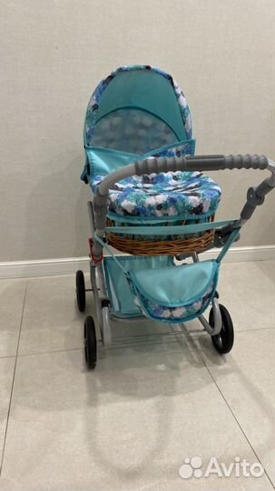 Детская игрушечная коляска