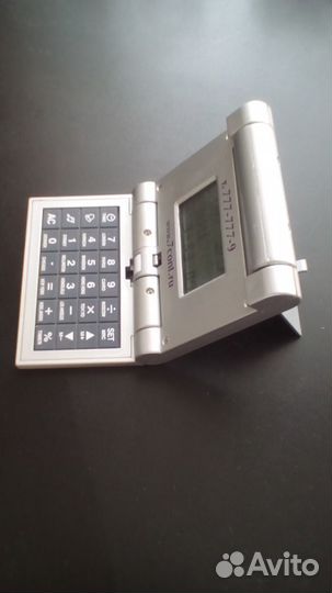 Часы-калькулятор. Складные, карманные