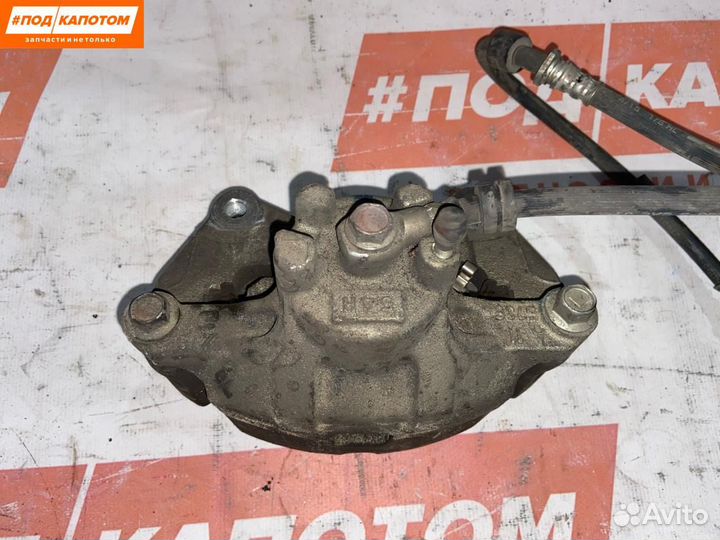 Суппорт тормозной передний левый Mitsubishi