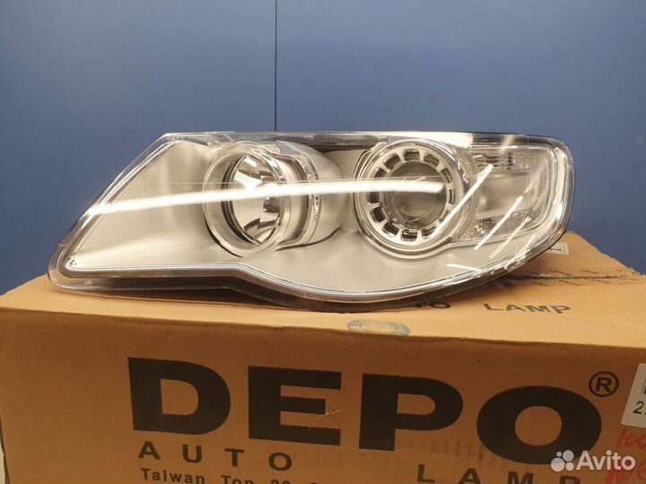 Фара левая Volkswagen Touareg 2002-2010
