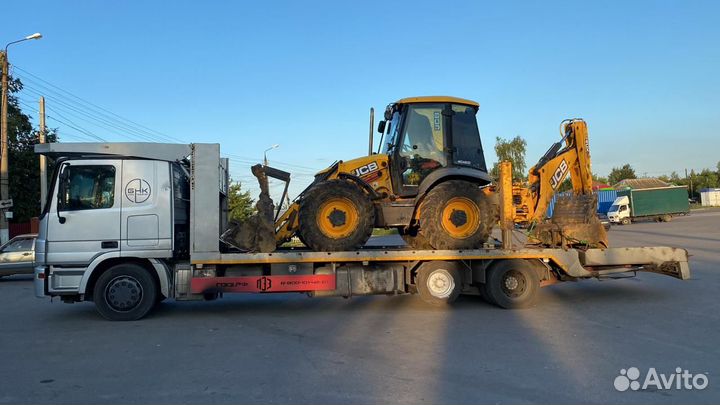 Грузовой эвакуатор перевозка спецтехники