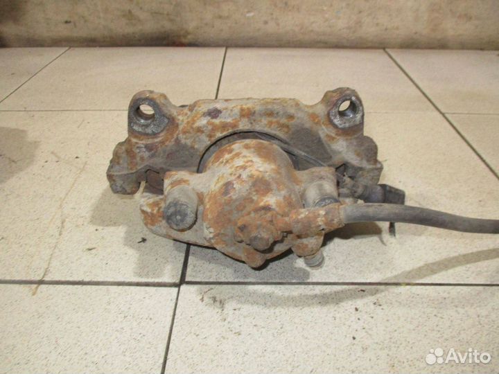 Суппорт передний левый VW Jetta 6 (1B)