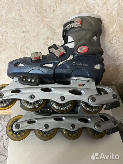 Роликовые коньки