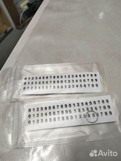 Брелок для ключей с номером телефона