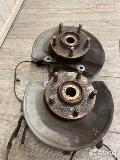 Кулаки поворотные в сборе Mitsubishi Lancer X