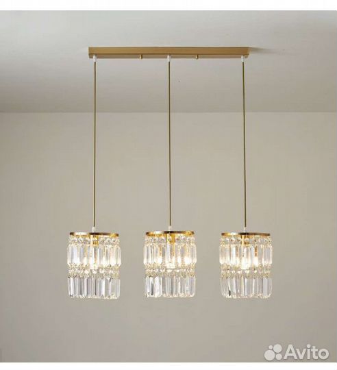 Люстра подвесная хрустальная над столом