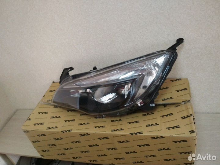 Фара левая Opel Astra j