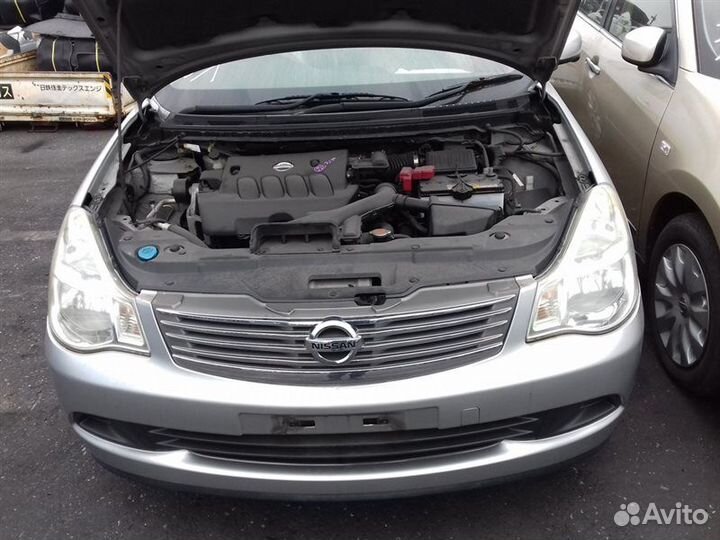 Замок двери задний левый Nissan Bluebird Sylphy