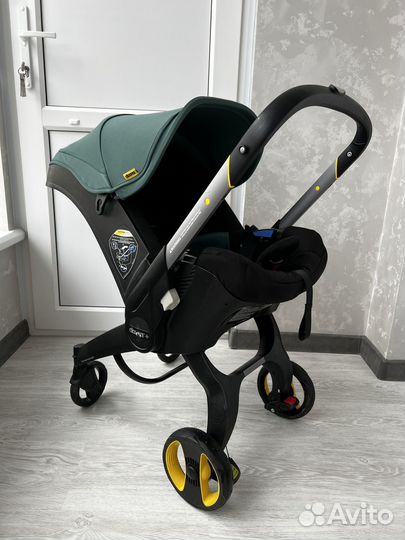 Коляска автокресло doona с базой isofix