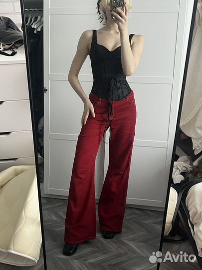 Джинсы расклешенные