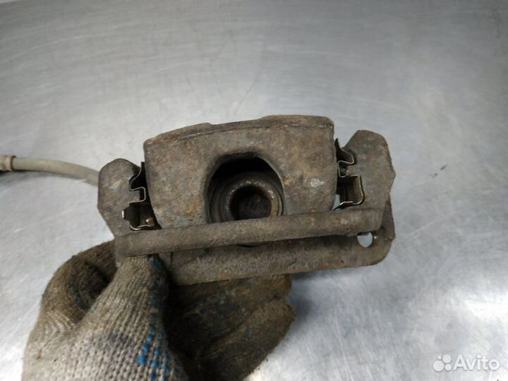 Суппорт задний левый Nissan X-Trail T31 MR20DE