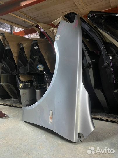 Крыло левое переднее Mitsubishi lancer 10