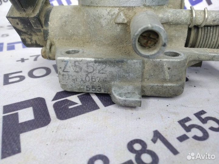 Дроссельная заслонка Mazda 323F 1996