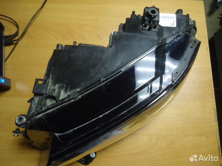 Фара левая Volkswagen Tiguan