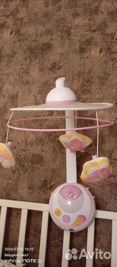 Музыкальный мобиль проэктр в кроватку