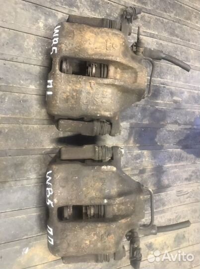 Суппорт передний левый. Правый Volkswagen Passat B