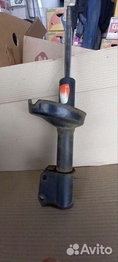 Стойка амортизатора передняя правая Renault Symbol