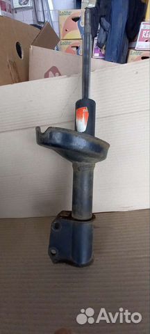 Стойка амортизатора передняя правая Renault Symbol