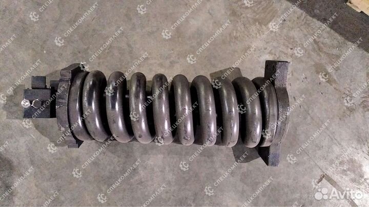 Механизм натяжения на CAT320DL, CAT320D, CAT320