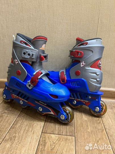 Роликовые коньки