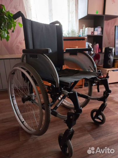 Инвалидной коляска