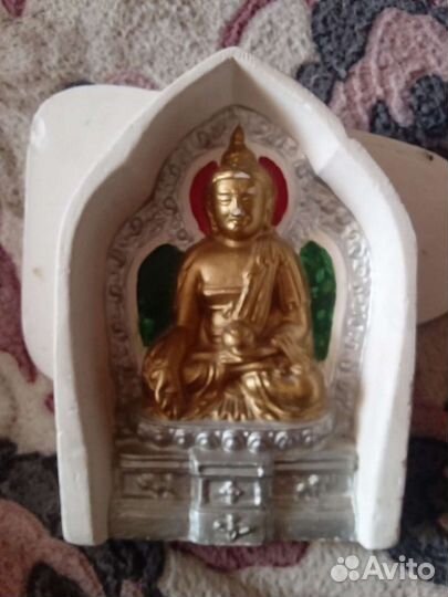Статуэтка будды