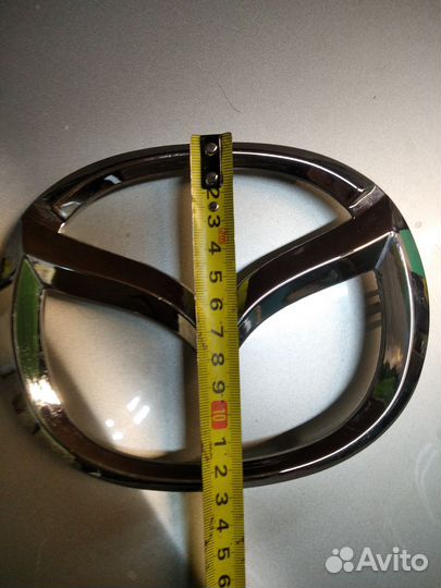 Эмблема мазда