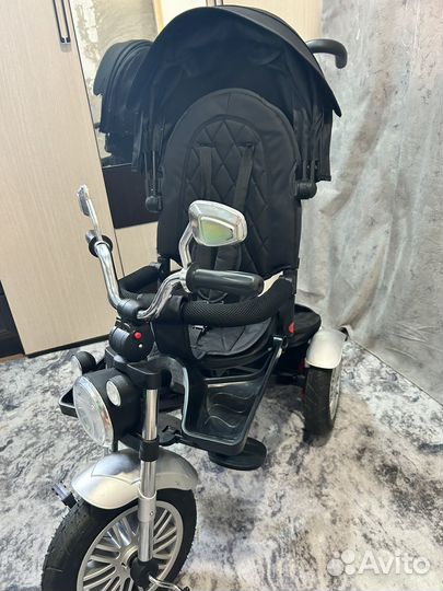 Трехколесный велосипед-коляска luxmom